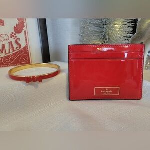 kate ❤️ spade Red Patent Leather Cardholder and Red and Gold Bow Tie Bracelet.